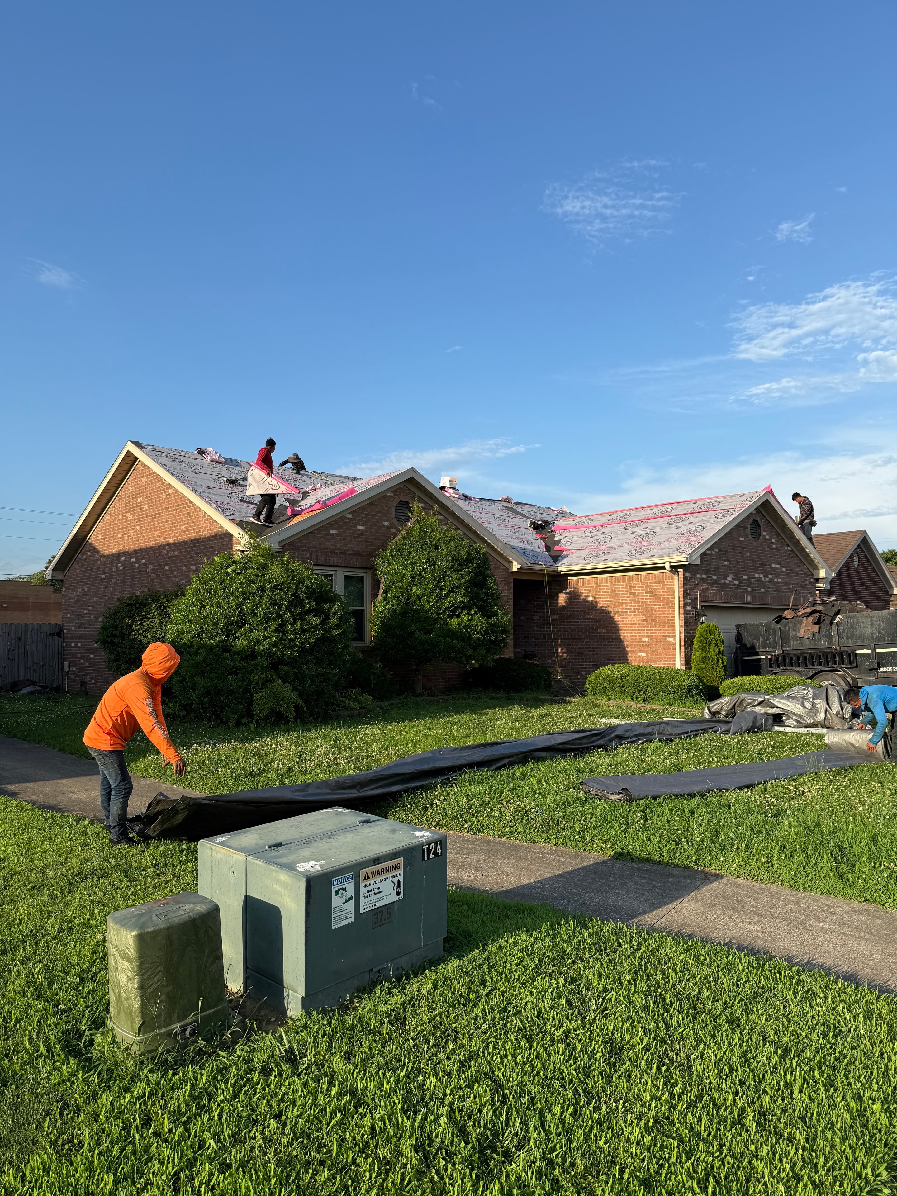 Rock's Roofs work truck on a job site